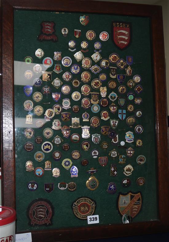 A collection of bowling club badges